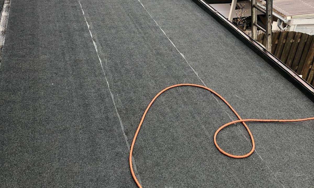 Renovatie van bitumen dak in 035